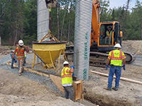 Installing MSE Wall Leveling pad at Lambert Road Bridge